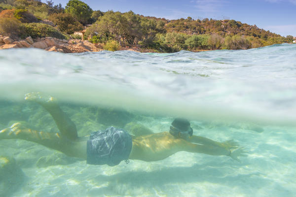 Snorkeling in the turquoise water in Marinella (Olbia), Olbia-Tempio province, Sardinia district, Italy