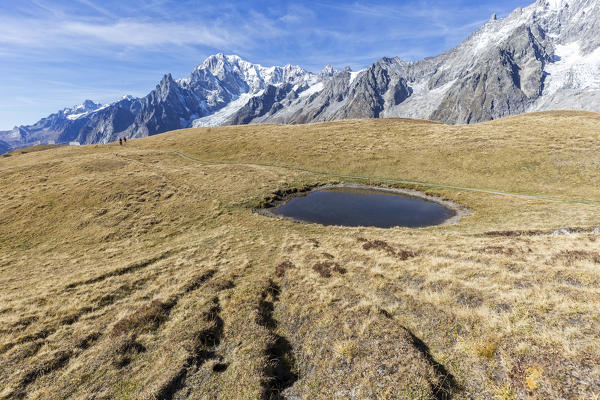 Little lake on Mont de la Saxe with view on Mont Blanc in autumn, Courmayeur, Aosta Valley, Italy, Europe