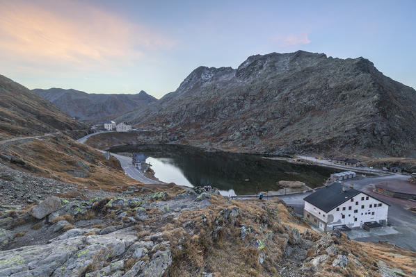 Sunrise view of lake at Gran San Bernardo Pass in autumn, Aosta Valley, Italy, Europe