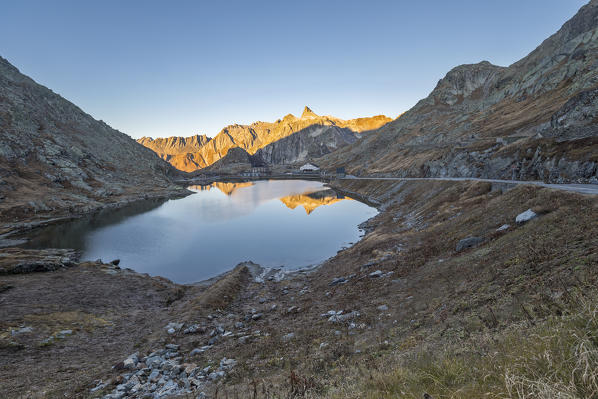 Sunrise at lake of Gran San Bernardo Pass in autumn
