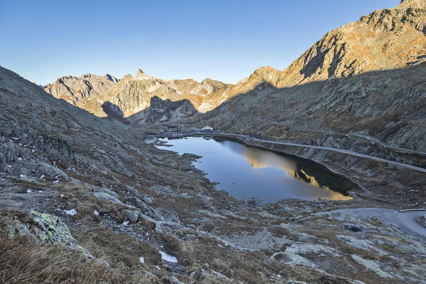 Sunrise at lake of Gran San Bernardo Pass in autumn