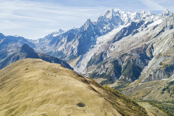 Aerial view of little lake on Mont de la Saxe and Mont Blanc in autumn, Courmayeur, Aosta Valley, Italy, Europe