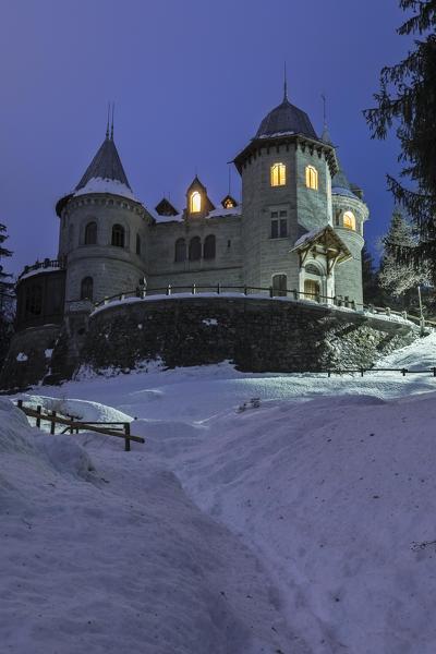 Savoia Castle at dusk, Gressoney-Saint-Jean, Gressoney Valley, Aosta Valley, Italy
