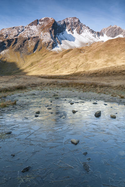 Frozen lake at the Colle del Piccolo San Bernardo, La Thuile, Aosta Valley, Italy