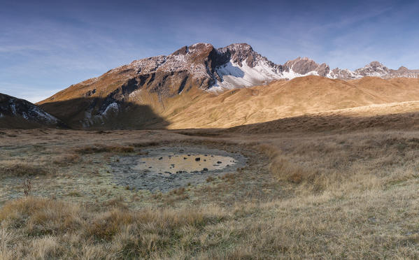 Frozen lake at the Colle del Piccolo San Bernardo, La Thuile, Aosta Valley, Italy