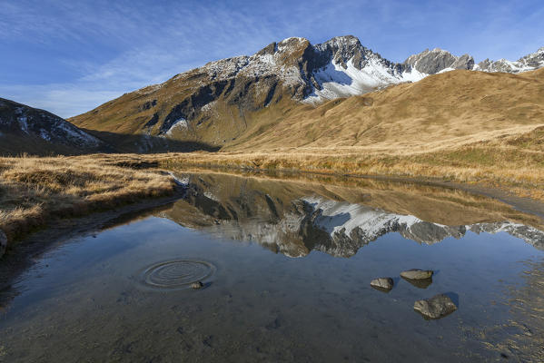 Lancebranlette reflected in Lake Verney at the Little St. Bernard Pass, La Thuile, Aosta Valley, Italy