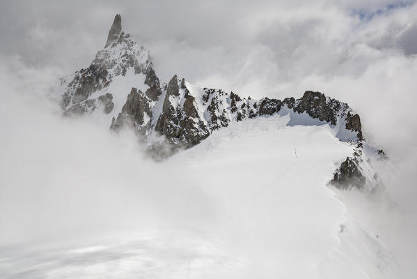 Glacier and Dente del Gigante hidden in the fog, Skyway, Courmayeur, Aosta Valley, Italy