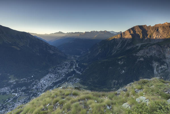 Panorama on Courmayeur and the central valley from Mont Chétif at sunrise, Aosta Valley, Italy