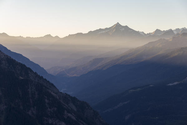 Panorama on Courmayeur and the central valley from Mont Chétif at sunrise, Aosta Valley, Italy