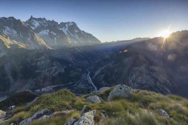 Panorama on Courmayeur and the central valley from Mont Chétif at sunrise, Aosta Valley, Italy