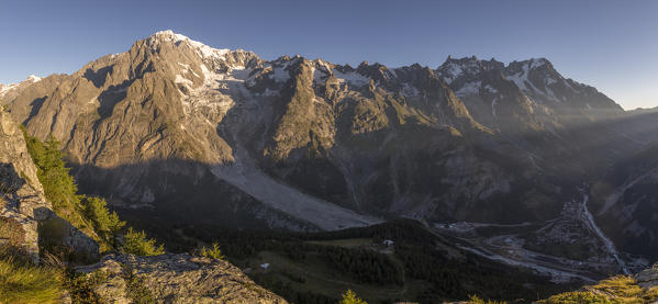 Sunrise on Mont Blanc chain and Courmayeur, Aosta Valley, Italy