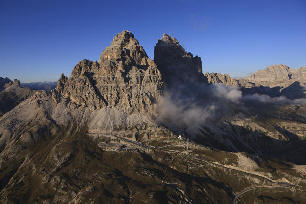 Three peak of Lavaredo. Below, the Auronzo hut.Natural park of Sexten Dolomites. It lies between the borders of the Veneto and Trentino Alto Adige regions. Italy. Europe. 