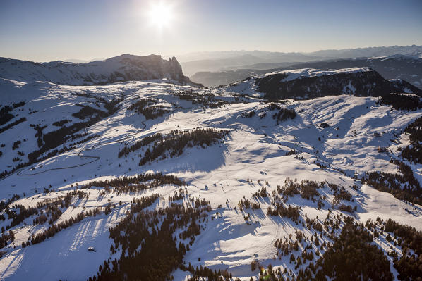 Aerial view of the Seiser Alm, the largest high altitude Alpine meadow in Europe. On background, the Schlern mountain.  Bolzano province, Trentino Alto-Adige region. Italy, Europe