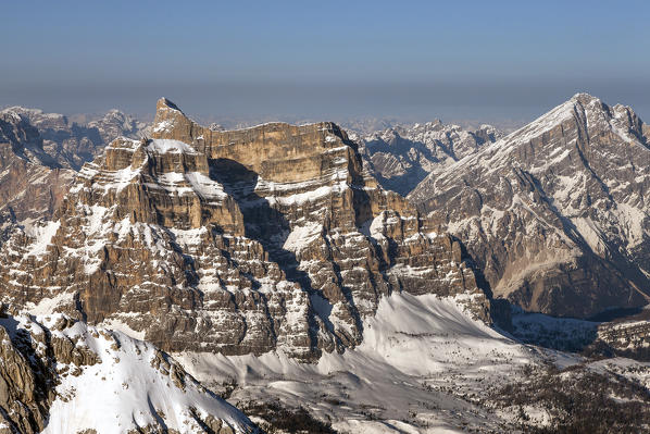 An aerial view of the Pelmo mountain, 3168m.asl (10,393ft). On background the Antelao mountain, 3264m.asl (10,708ft) Dolomites. Belluno province, Veneto region, Italy, Europe. 