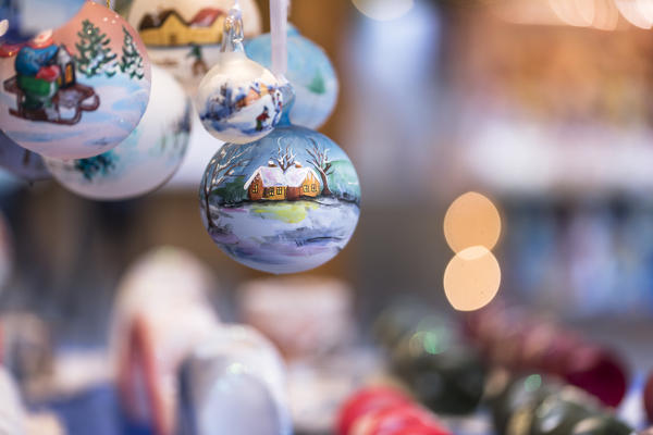 a detail of hand painted Christmas balls into the traditional Christmas Markets in South Tyrol, Bolzano province, Trentino Alto Adige, Italy
