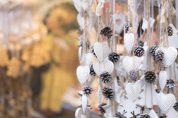 a detail of hand painted white hearts into the traditional Christmas Markets in South Tyrol, Bolzano province, Trentino Alto Adige, Italy