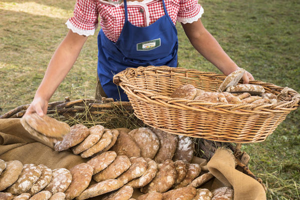 a basket full of schüttelbrot, the typical south tyrolean bread, bolzano province;italy;south tyrol;trentino alto adige