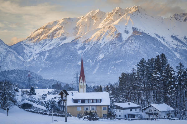 The village of Vill in winter with the Nordkette in the background, Innsbruck, Tyrol, Austria, Europe