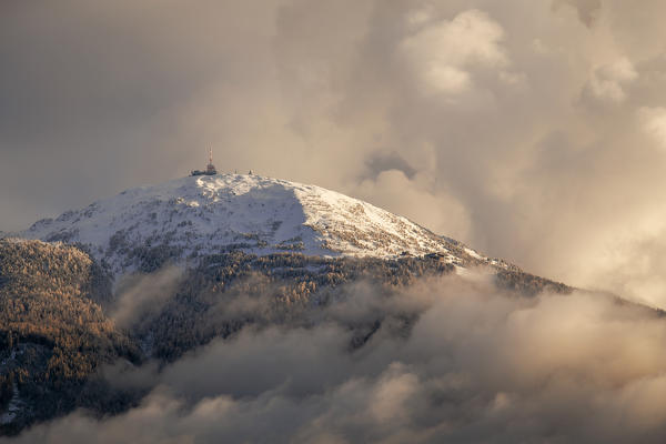Patscherkofel mountain sourrounded by the clouds, Innsbruck, Tyrol, Austria, Europe