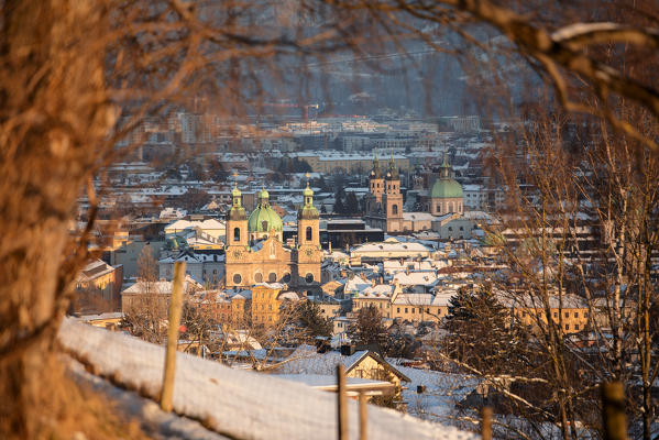 The cathedral and the Jesuit church in Innsbruck on a snowy day, Innsbruck, Tyrol, Austria, Europe