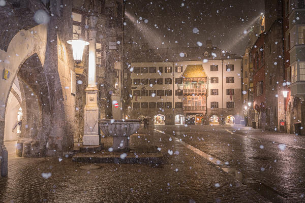 A snowy evening in the inner city of Innsbruck, Tyrol, Austria, Europe