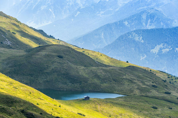 Lake Lichtsee in the Stubai Alps with the Tux Alps in the background, Obernbergtal, Obernberg am Brenner, Innsbruck Land, Tyrol, Austria, Europe