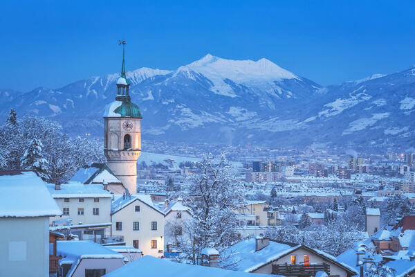 The tower of the old parish church of Hötting on a cold freezing evening, Innsbruck, Tyrol, Austria, Europe