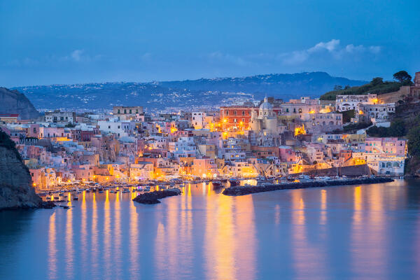 The view over Marina di Corricella in the evening, Belvedere Elsa Morante, Procida island, Neaples province, Campania region, Italy, Europe