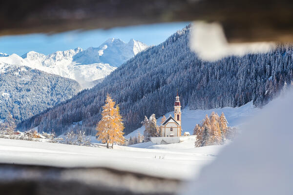 The parish church of St. Nikolaus after a heavy snowfall, Obernberg am Brenner, Innsbruck Land, Tyrol, Austria, Europe 