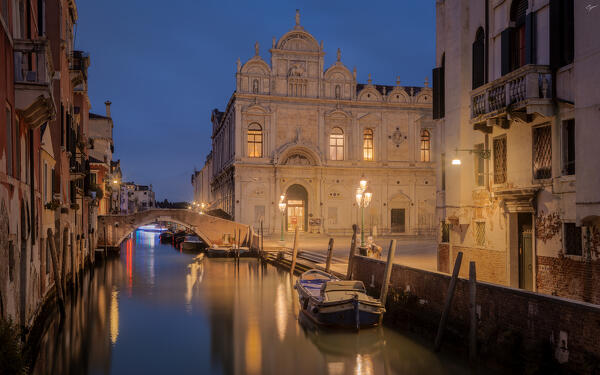 The Scuola Grande di San Marco building and Fondamenta Dandolo at night as seen from the bridge to Calle de le Erbe, Venice province, Veneto region, Italy, Europe