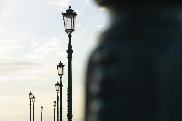 Detail of a row of typical street lamps in Burano, Venice, Veneto, Italy, Europe