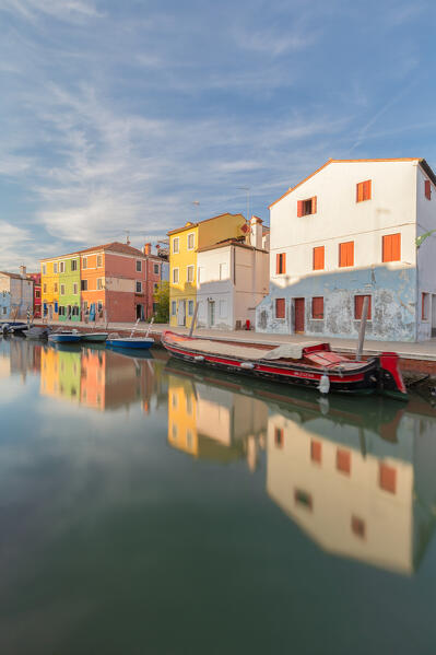 The typical buildings of Fondamenta della Pescheria reflected by the canal, Burano Island, Venice, Veneto, Italy, Europe
