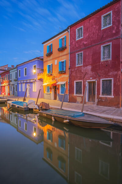 The brighly painted buildings of Fondamenta Cavanella before the dawn, Burano Island, Venice, Veneto,Italy, Europe