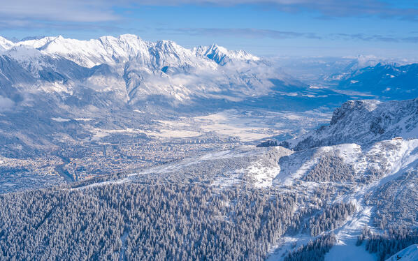 The view of Innsbruck and the Inn valley on a winter day as seen from the Hoadl mountain, Axamer Lizum, Axams, Innsbruck Land, Tyrol, Austria, Europe