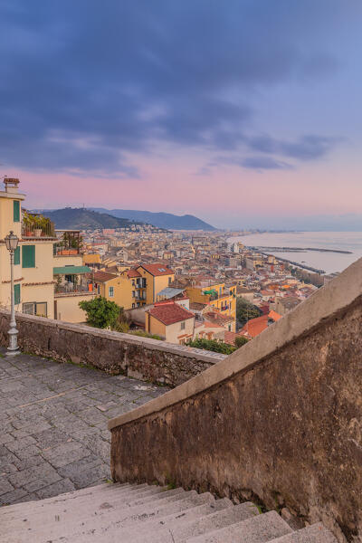 One of the many staircases of the historic centre of Salerno at dusk, Campania, Italy, Europe