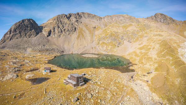 Aerial view of Lago di Sanes - Sandessee with Pflerscher Pinggl - Picco di Fleres mountain in the background, Ladurns, Bolzano district, South Tyrol, Italy, Europe