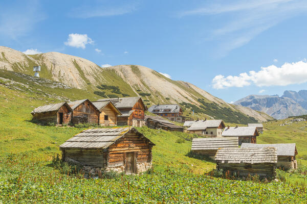 The traditional buildings of the alpine region and Rifugio Sennes on a summer day, Fanes-Sennes-Braies natural park, Bolzano province, Trentino Alto Adige, Italy, Europe