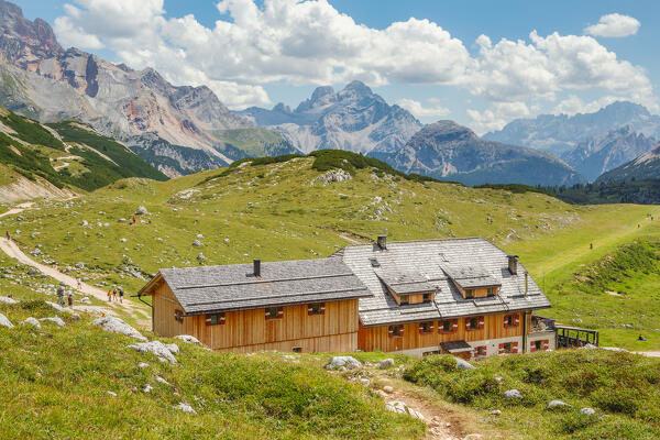 View of Rifugio Sennes on a summer day with the Dolomites in the background, Fanes-Sennes-Braies natural park, Bolzano province, Italy, Europe 