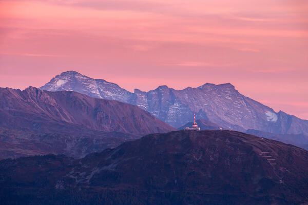 The Patscherkofel peak at dusk with Schrammacher mountain and its range in the background, as seen from the Seegrube station in Innsbruck, Nordkette, Tyrol, Austria, Europe