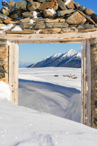 The view beyond the old ruin in the nearby of Krimpenbach Alm hut, Oberperfuss, Innsbruck Land, Tyrol, Austria, Europe