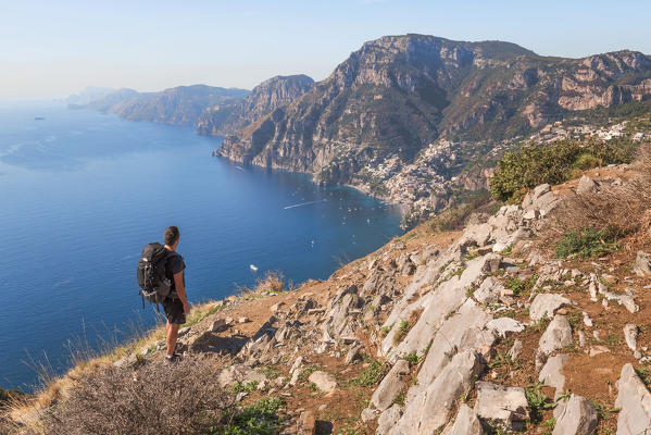 a man watching Positano and the Amalfi Coast from the Path of Gods, Salerno, Campania, Italy, Europe