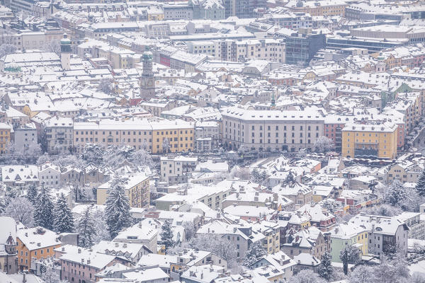 The snowy rooftops of Innsbruck seen from Planötzenhof, Innsbruck, Tyrol, Austria, Europe