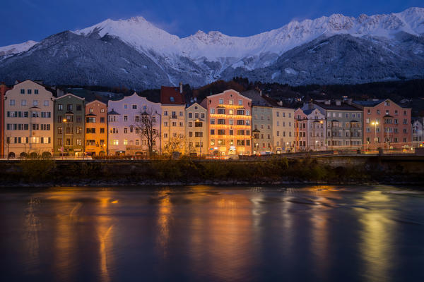 The buildings of Mariahilf at evening with the Nordkette in the background, Tyrol, Austria, Europe