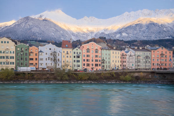 The buildings of Mariahilf with the snowy Nordkette in the background, Tyrol, Austria, Europe