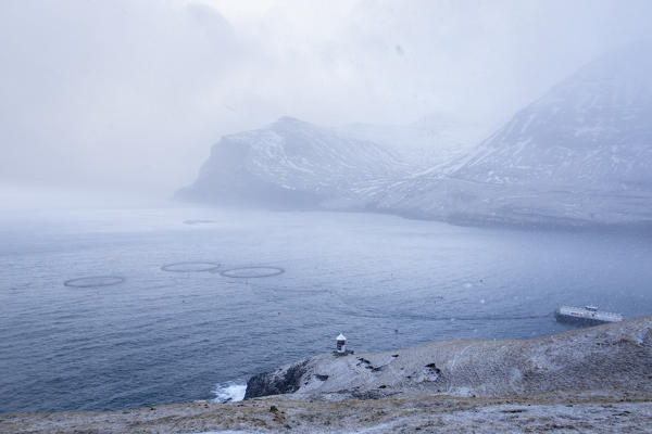 Snowfall during the walk to Drangarnir Arch Islet (Vagar Island, Faroe Islands, Denmark)