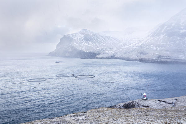 Snowfall during the walk to Drangarnir Arch Islet (Sorvagsfjordur, Vagar Island, Faroe Islands, Denmark)