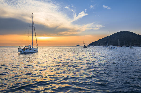 Mooring sailboats at sunset in Elba Island (Viticcio, Livorno, Tuscany, Tuscan Archipelago, Italy, Ligurian Sea, Mediterranean Sea, Europe)