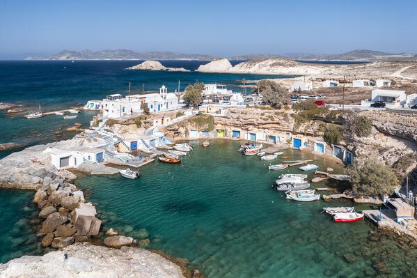 Aerial view of the small fishing village of Mandrakia and its small port (Plaka, Milos Island, Cyclades Islands, Greece, Europe)