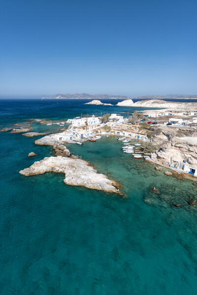 Aerial view of the small fishing village of Mandrakia and its small port (Plaka, Milos Island, Cyclades Islands, Greece, Europe)