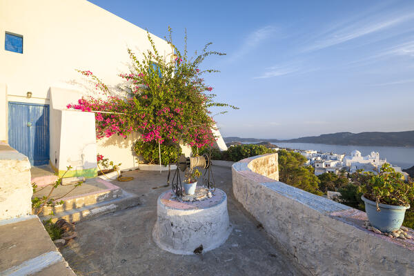 Going up to the Venetian Castle of the village of Plaka (Milos Island, Cyclades Islands, Greece, Europe)